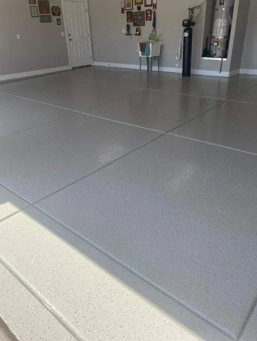 Gray speckled epoxy garage floor.