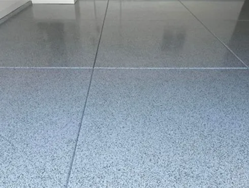 Gray speckled epoxy garage floor.